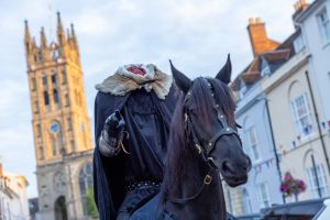 290A1444 Headless Horseman spotted as mystery rider makes his way towards Warwick Castle