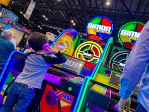 Simon Arcade Player There’s More to Discover: SEGA Amusements Brings Big Arcade Experiences to IAAPA Expo Europe 2026!