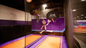 trampoline basketball Altitude Trampoline Park celebrates latest location